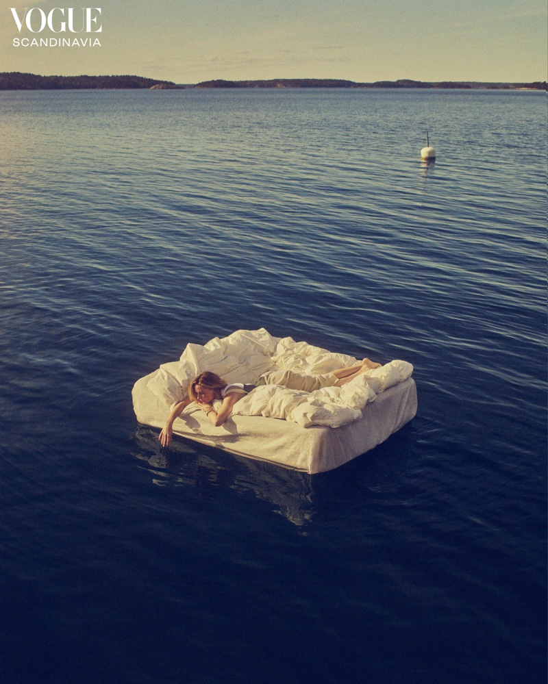 Floating on water, Rebecca Ferguson has a tranquil moment.