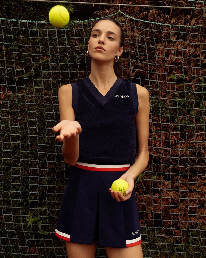 Sporty & Rich features a v-neck vest and Mila mini skirt from its summer Tennis Drop.