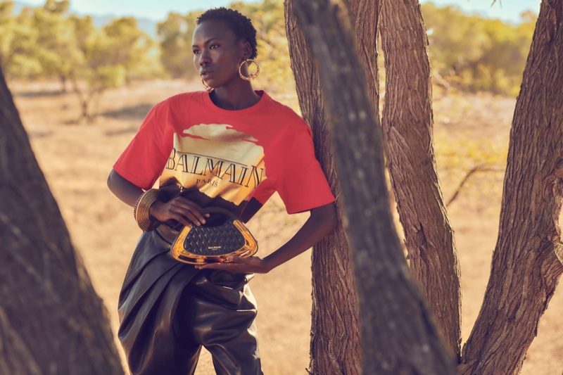 Balmain's The Lion King collection features metallic graphic tees.