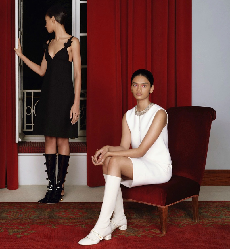 Elodie Guipaud and Nayonikaa Shetty pose in chic dresses and boots for Dior's fall 2024 ad.