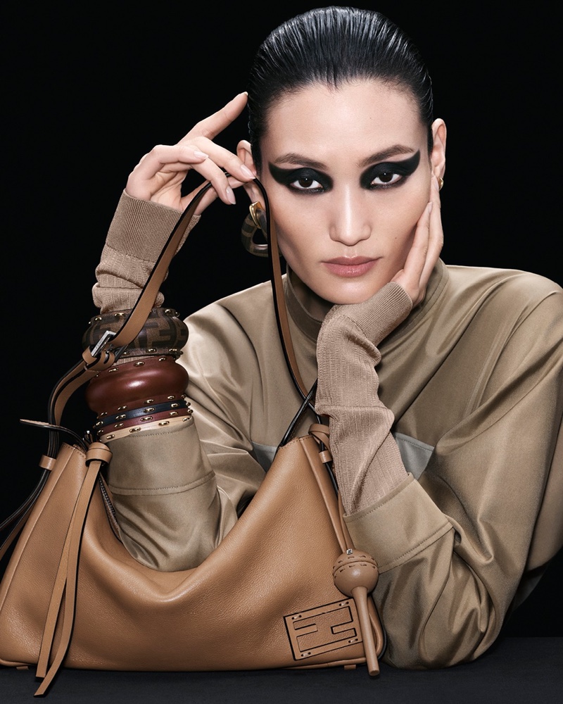 Posing with the Simply Fendi bag, Lina Zhang fronts Fendi's fall-winter 2024 ad.