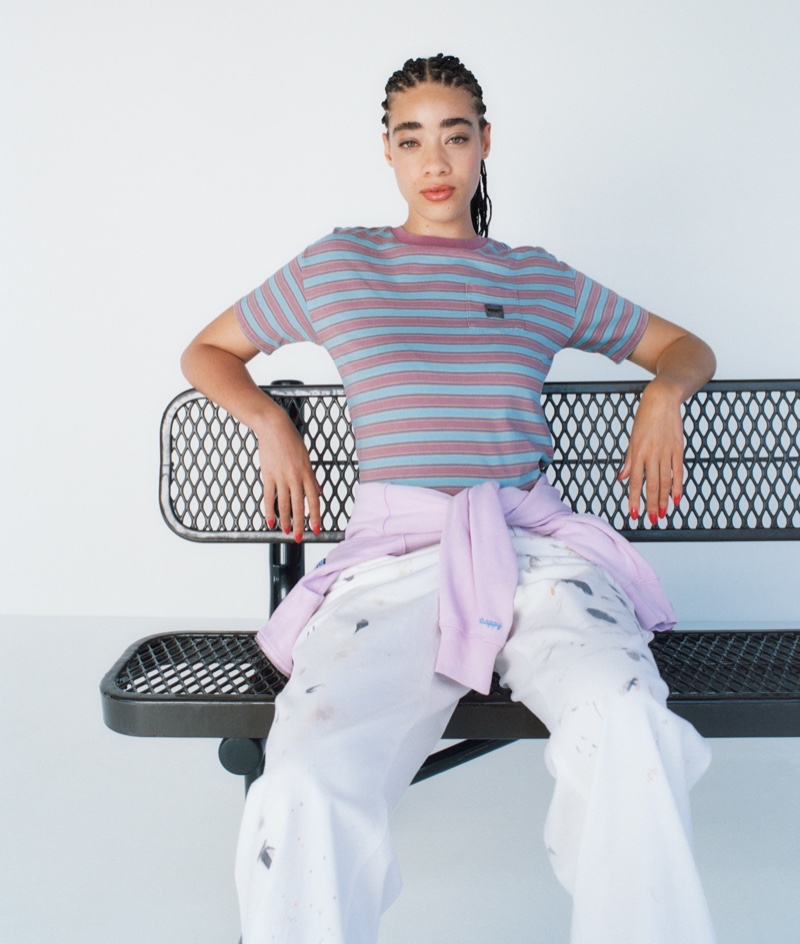 Reign Judge wears a striped shirt and denim for Gap's Madhappy collaboration.