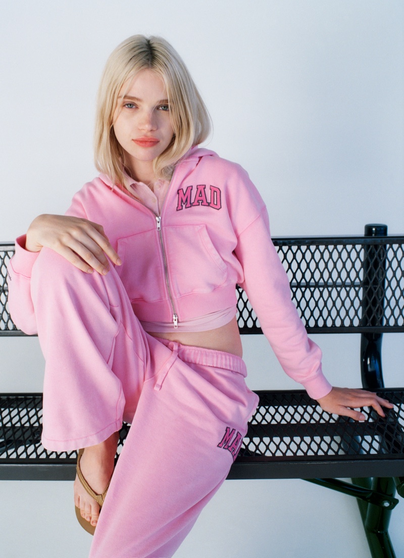 Stella Lucia sports a pink hoodie and sweatpants for Gap & Madhappy campaign.