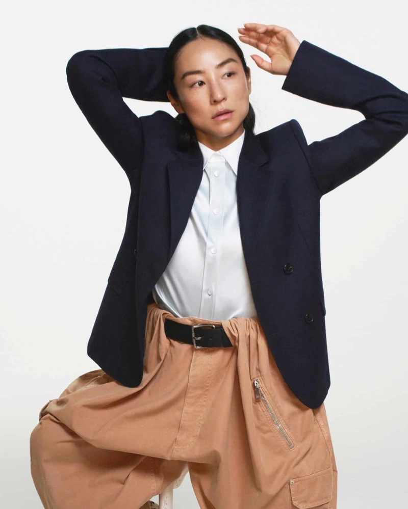 Actress Greta Lee wears menswear-inspired tailoring for Loewe's fall 2024 campaign.