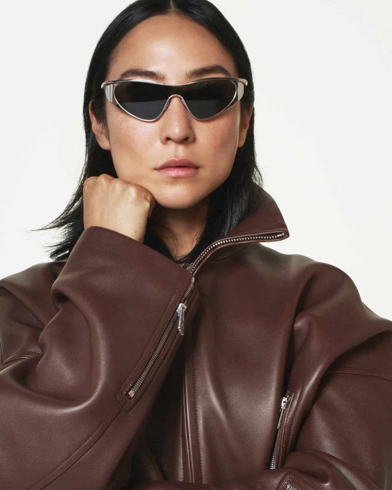 Ready for her closeup, Greta Lee wears sunglasses in Loewe's fall 2024 campaign.