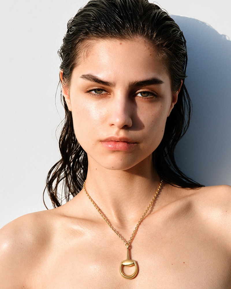 Ana Rossolovich models pendant necklace from Gucci's Horsebit Fine Jewelry collection.