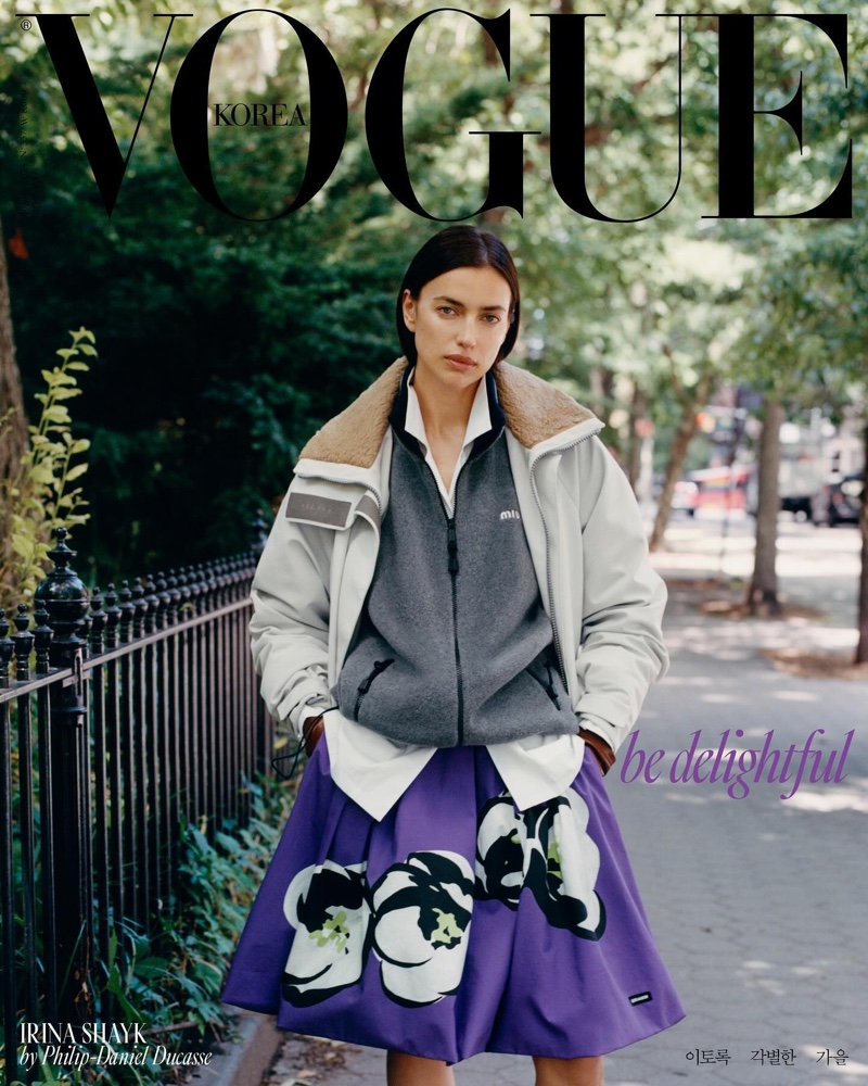 Model Irina Shayk wears Miu Miu jackets, shirt, and skirt for Vogue Korea's August 2024 cover.