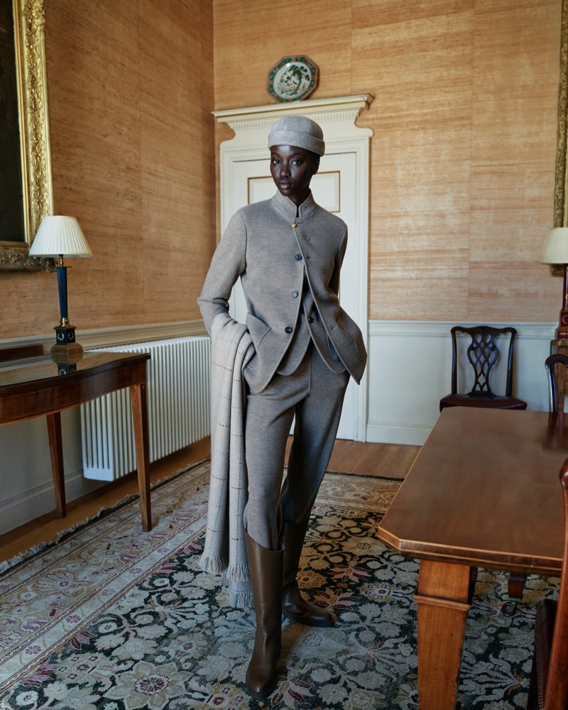 Anok Yai shows off the Loro Piana Spagna Mini jacket with the Rassa trousers for the brand's fall 2024 ad.