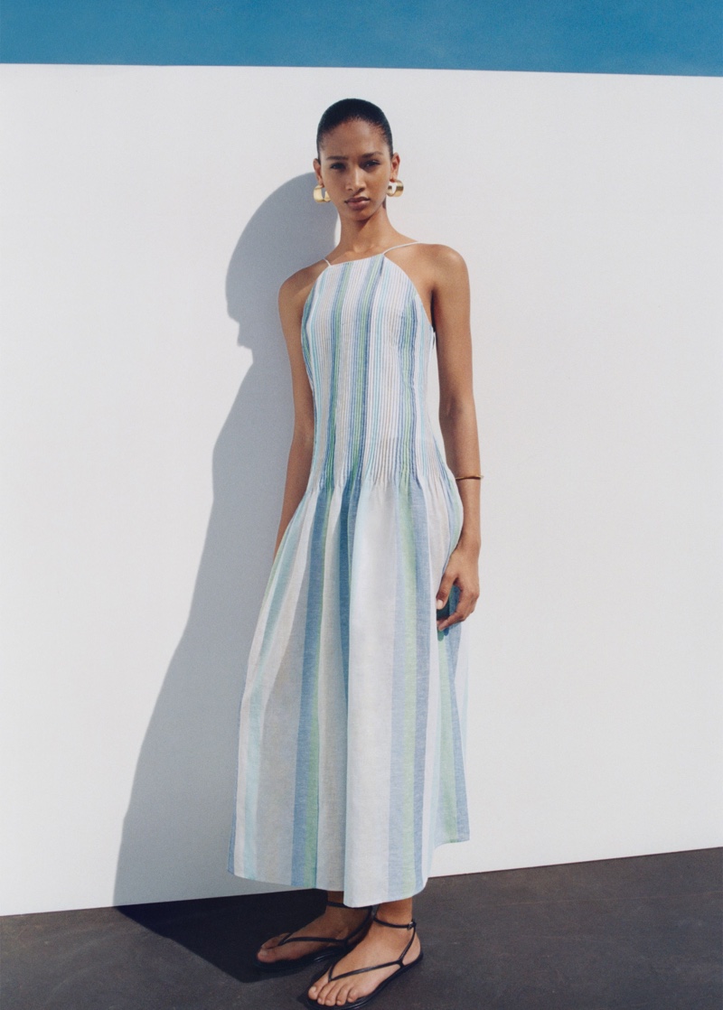 Embracing summer vacation vibes, Mango features a striped linen dress.