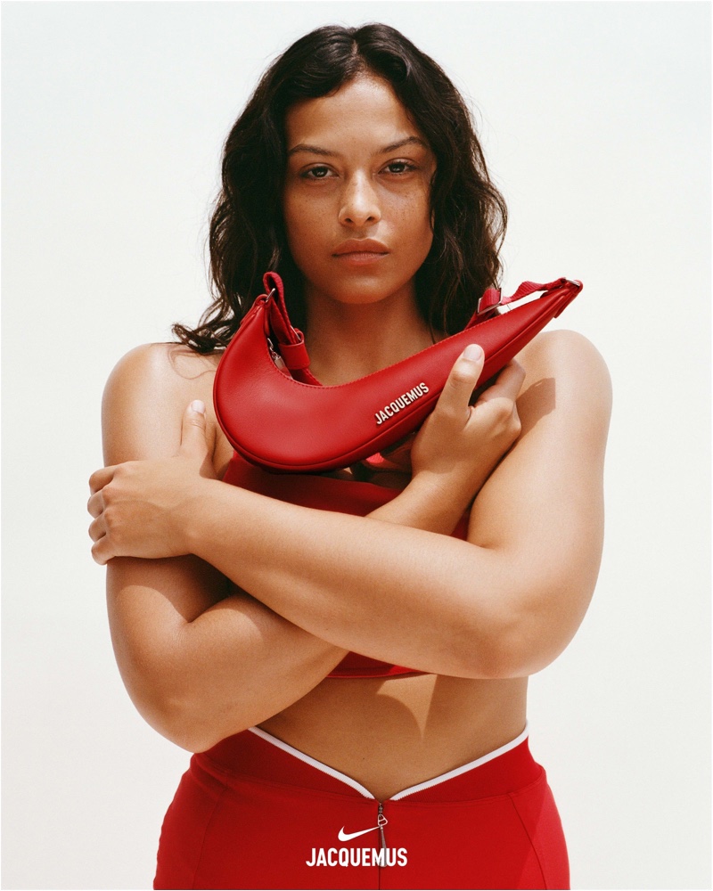 Devyn Garcia poses with the Le Swoosh bag for Nike x Jacquemus summer 2024 collection.