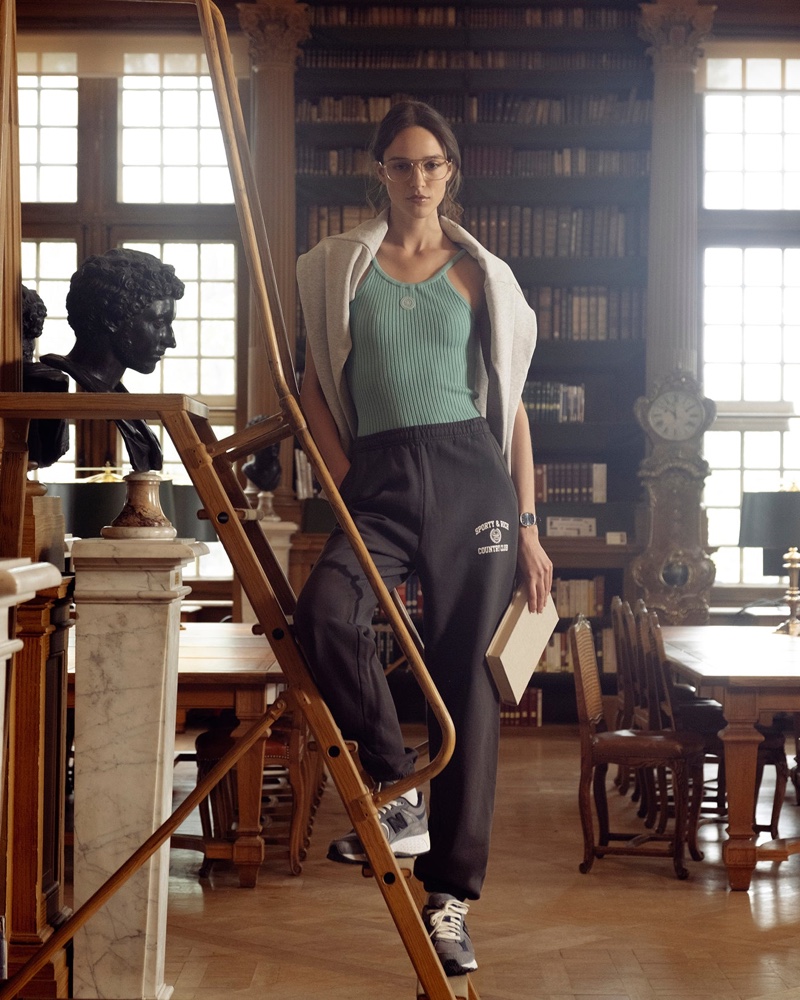 Emm Arruda shows off Sporty & Rich's Ivy League drop featuring sweatpants and knit tank look.