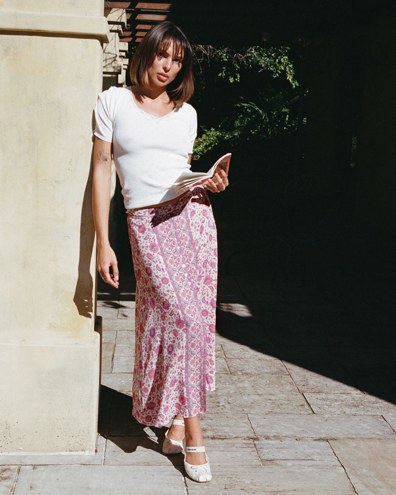 Catching the sun's rays, Arhem spotlights its Gabriel midi skirt in blossom.