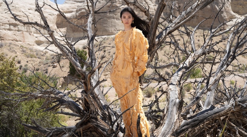 Hejia Li shines in a yellow dress for the Bottega Veneta winter 2024 ad.