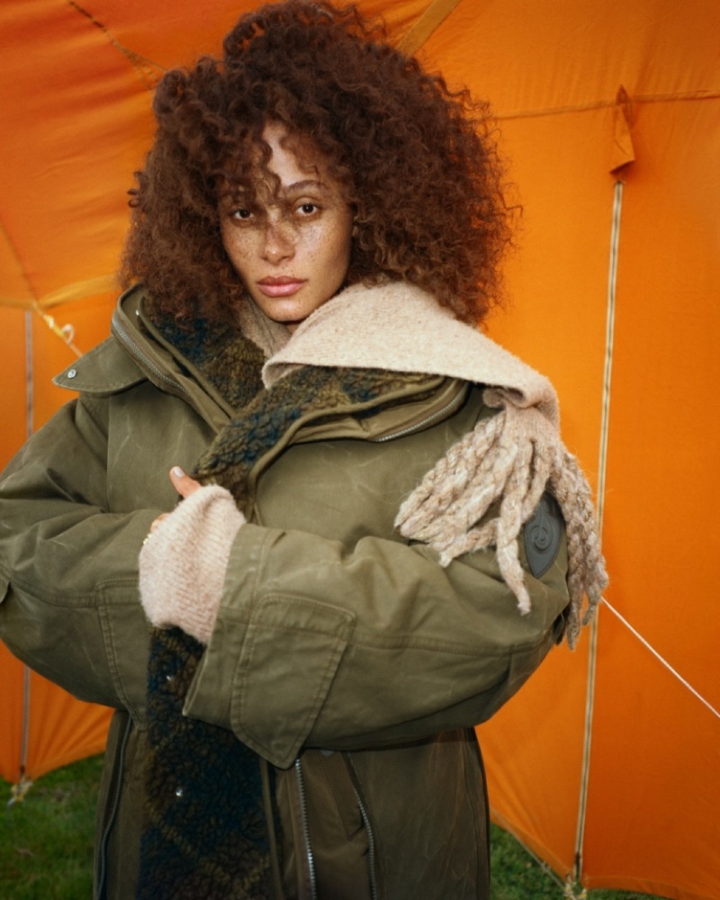 Adwoa Aboah layers up in a coat for Burberry's winter 2024 ad.