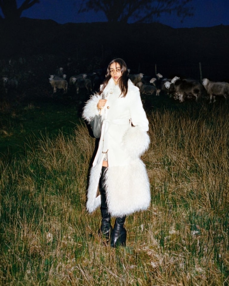 Nora Attal shows off a shearling coat in the Burberry winter 2024 campaign.