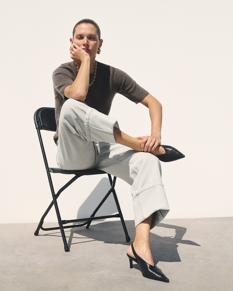 COS pairs a cashmere t-shirt with relaxed jeans for pre-fall 2024.