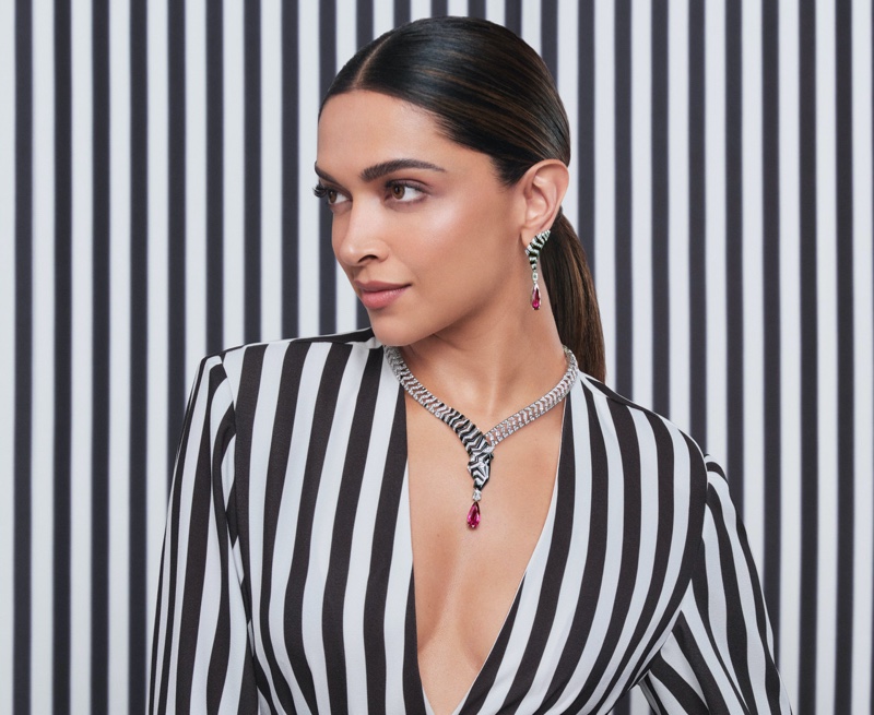 Wearing stripes, Deepika Padukone fronts Cartier's Nature Savage high jewelry ad.