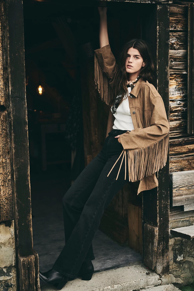 Channeling western style, Free People spotlights the Fringe Out vegan suede jacket.