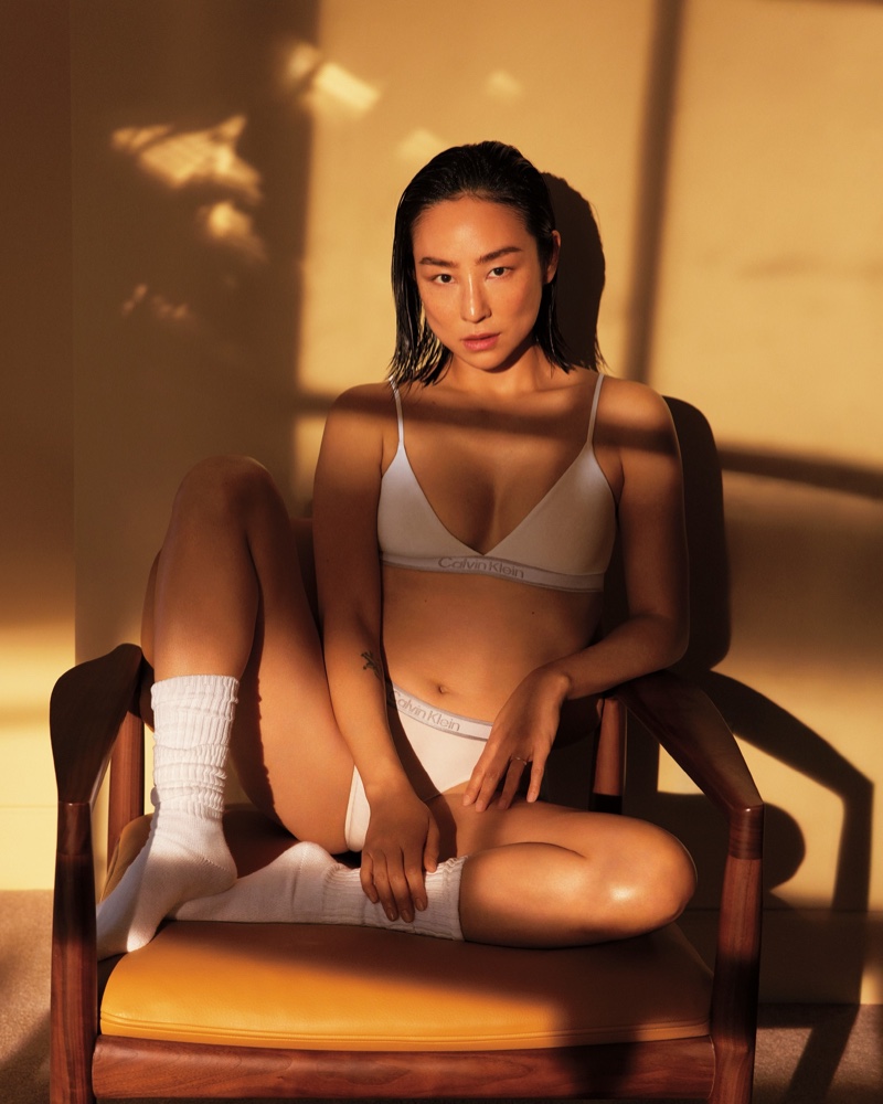 Wearing a matching set, Greta Lee poses in Calvin Klein's new Tonal Logo Underwear for the fall 2024 season.