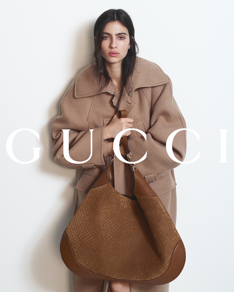 Loli Bahia models with the Gucci B bag for the brand's fall-winter 2024 ad.