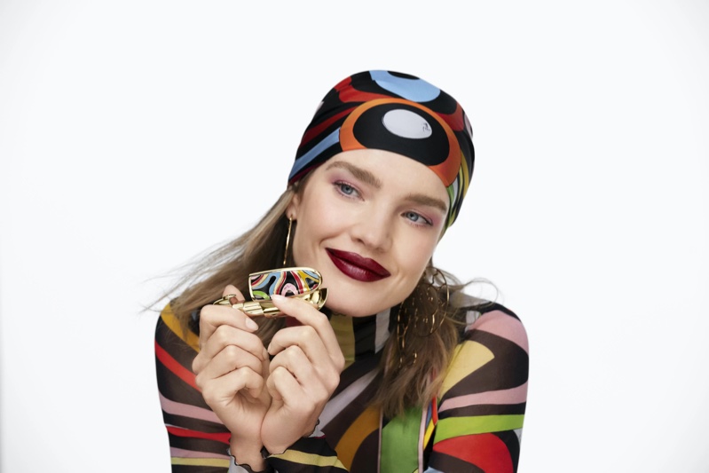 Natalia Vodianova poses with the Guerlain x Pucci makeup collection.