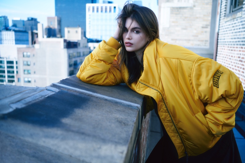 Kaia Gerber shines in a yellow oversized jacket for DKNY's fall 2024 ad.