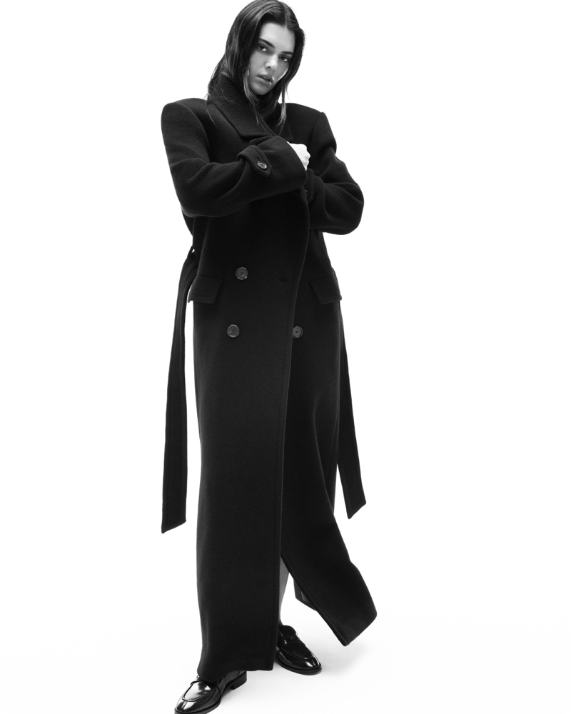 Kendall Jenner layers up in a long overcoat for the MO&Co. Noir collection.