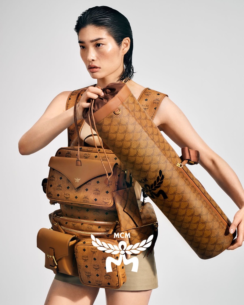 MCM features monogram leather accessories in its fall 2024 campaign.