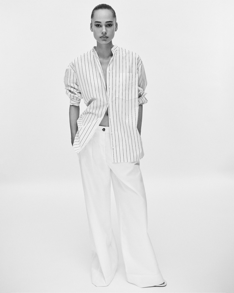 Annemary Aderibigbe wears Massimo Dutti striped shirt and pleated trousers.