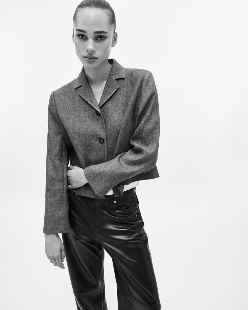 Annemary Aderibigbe shows off Massimo Dutti's cropped jacket and leather pants.