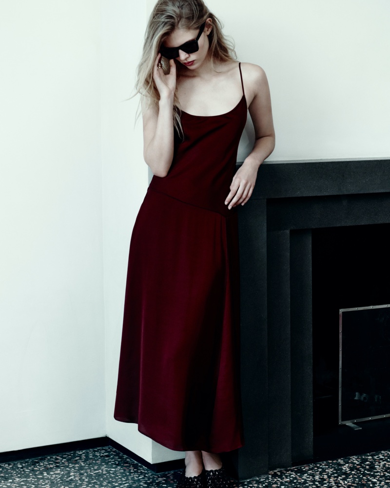 Ida Heiner wears a Massimo Dutti strappy slip dress in burgundy for the pre-fall season.