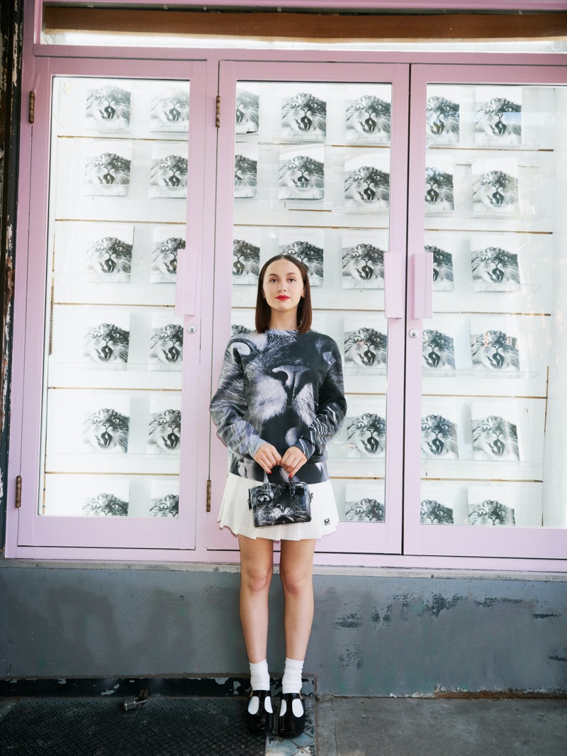 Maude Apatow poses at Tory Burch's Corner Store in SoHo for the new Animal House capsule collection.