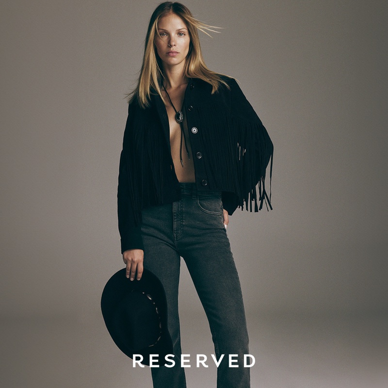 Reserved features a fringe-adorned jacket and jeans in its recent trend guide.