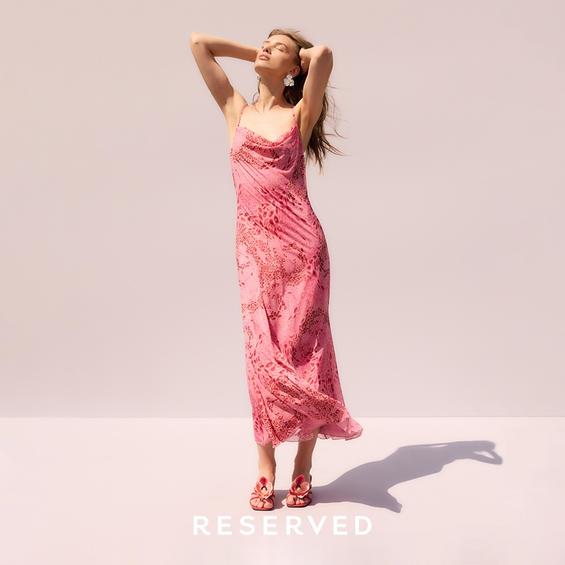 Reserved embraces flower power with its pink slip dress paired with heeled sandals for summer.