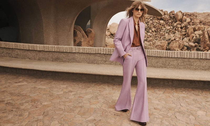 Aivita Muze shows off a tailored pantsuit for Zimmermann's fall 2024 campaign.