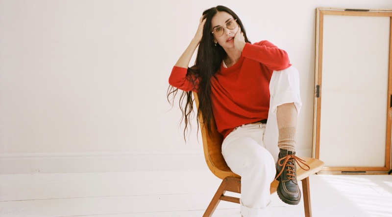 Keeping it casual, Demi Moore models J. Crew cashmere sweater and high-rise jeans for fall 2024.