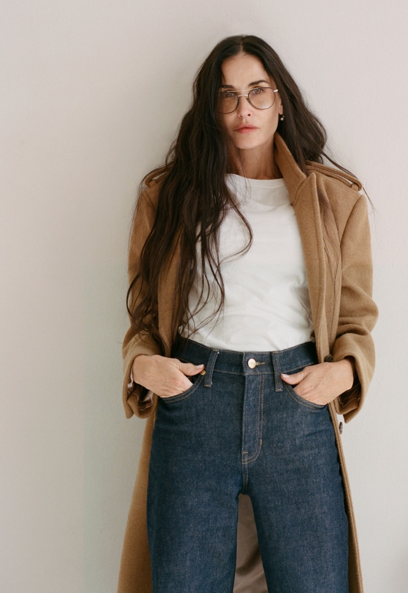 Demi Moore poses in J. Crew's wrap coat, pima cotton t-shirt and jeans for the brand's fall 2024 catalog.