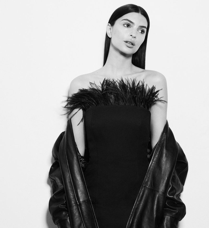 Emily Ratajkowski models Marella's feathered dress and leather coat for fall 2024.