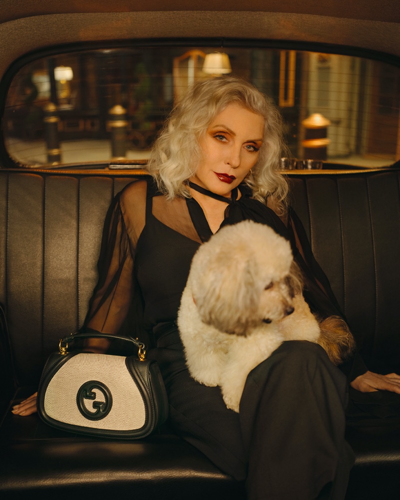 Debbie Harry wears a dark look for Gucci's Blondie bag campaign.