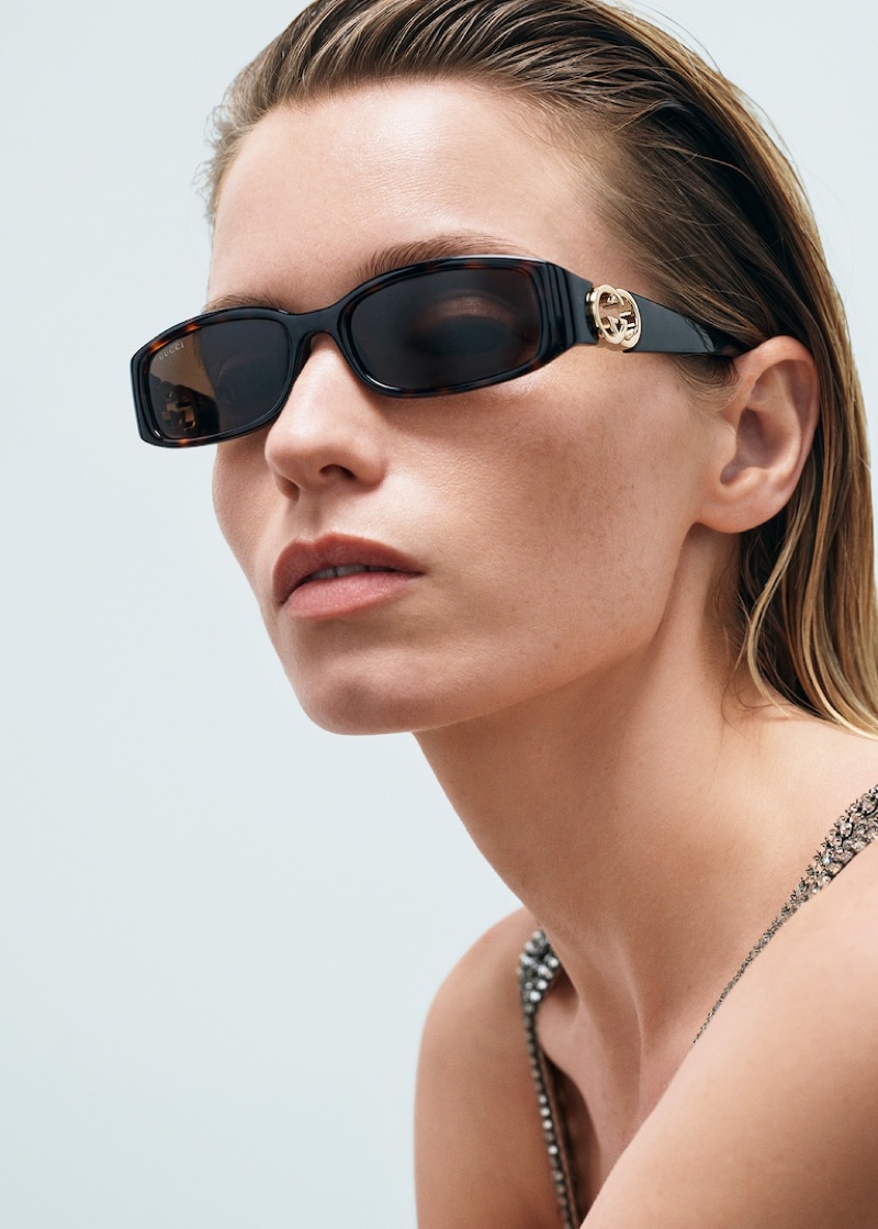 Ready for her closeup, Abbey Lee Kershaw wears sleek sunglasses for Gucci eyewear's fall-winter 2024 campaign.