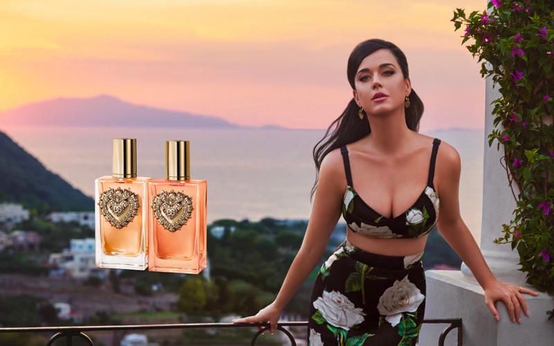 Wearing a floral print set, Katy Perry fronts Dolce & Gabbana's Devotion Intense scent.