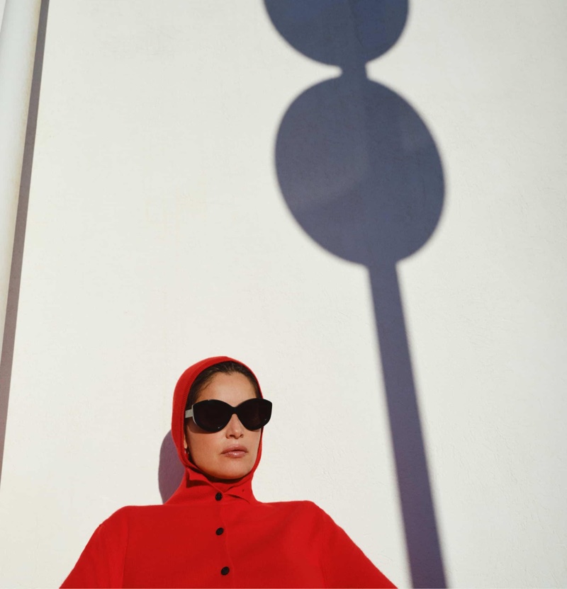 Dressed in red, Laetitia Casta shows off sunglasses in Massimo Dutti's fall looks.