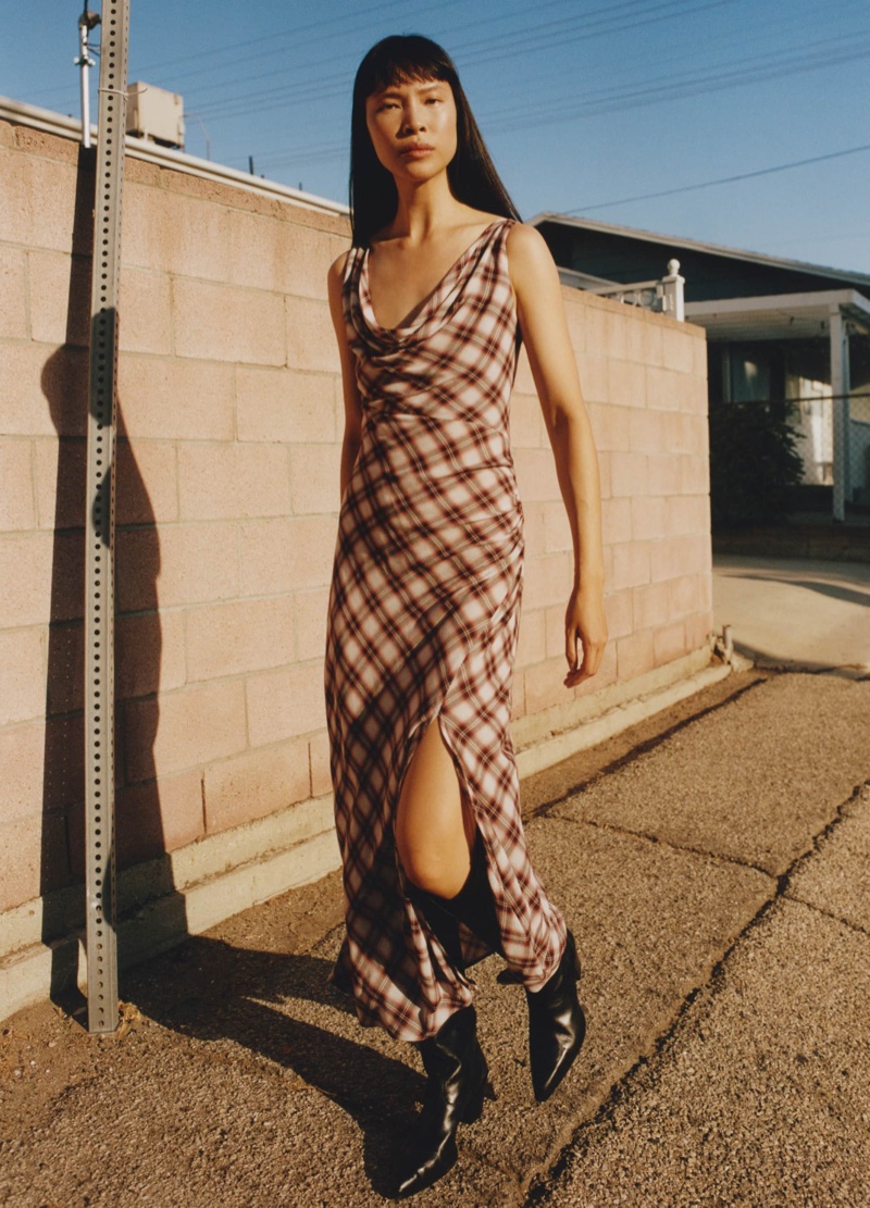 Go for a rustic chic vibe with Mango's plaid print dress and cowboy boots.