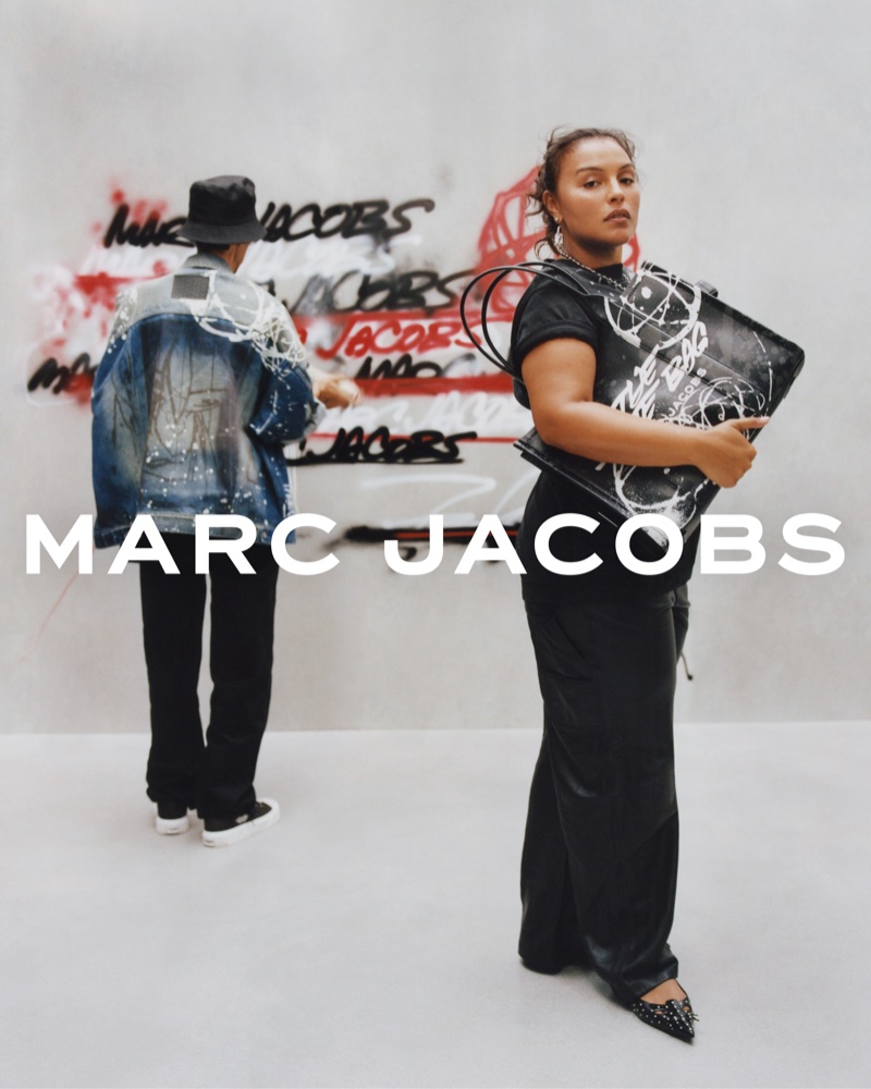 Paloma Elsesser poses with The Tote Bag for Marc Jacobs x Futura's collaboration.