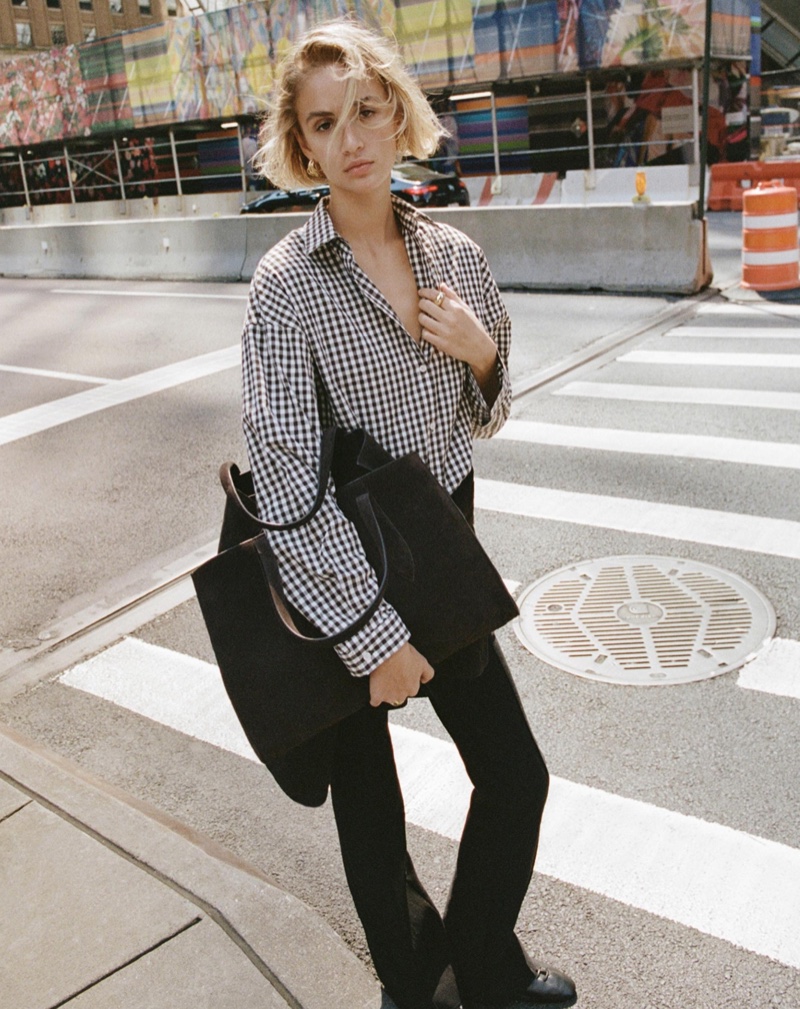 Massimo Dutti shows off a gingham cotton shirt and oversized tote bag for the pre-fall season.