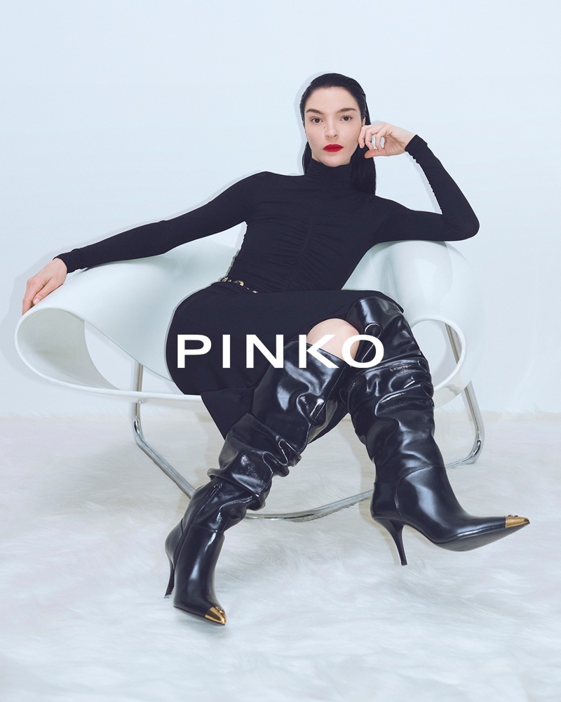 Pinko features a sleek sweater dress and leather boots in its fall 2024 campaign.