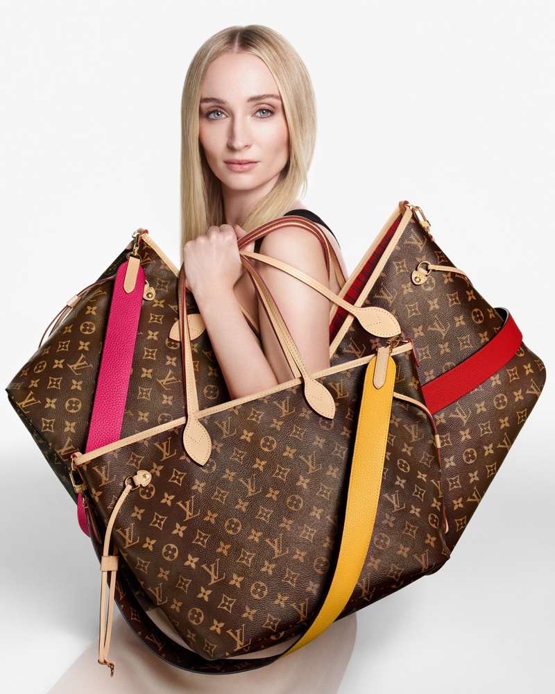 Actress Sophie Turner poses with Louis Vuitton's new reversible Neverfull Inside Out bag.