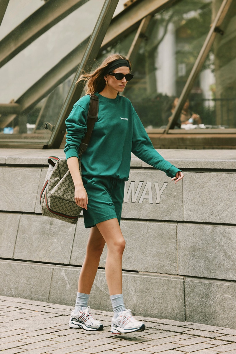 Altyn Isabella models Sporty & Rich's Wall Street drop featuring athleisure staples.