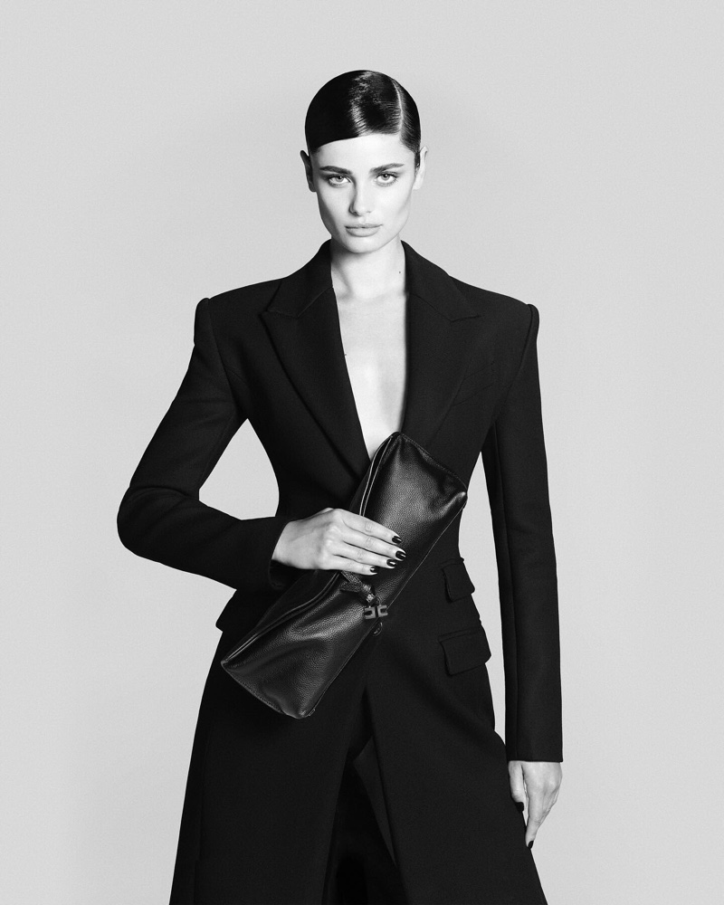 Taylor Hill models tailored looks for Elisabetta Franchi's fall-winter 2024 campaign.