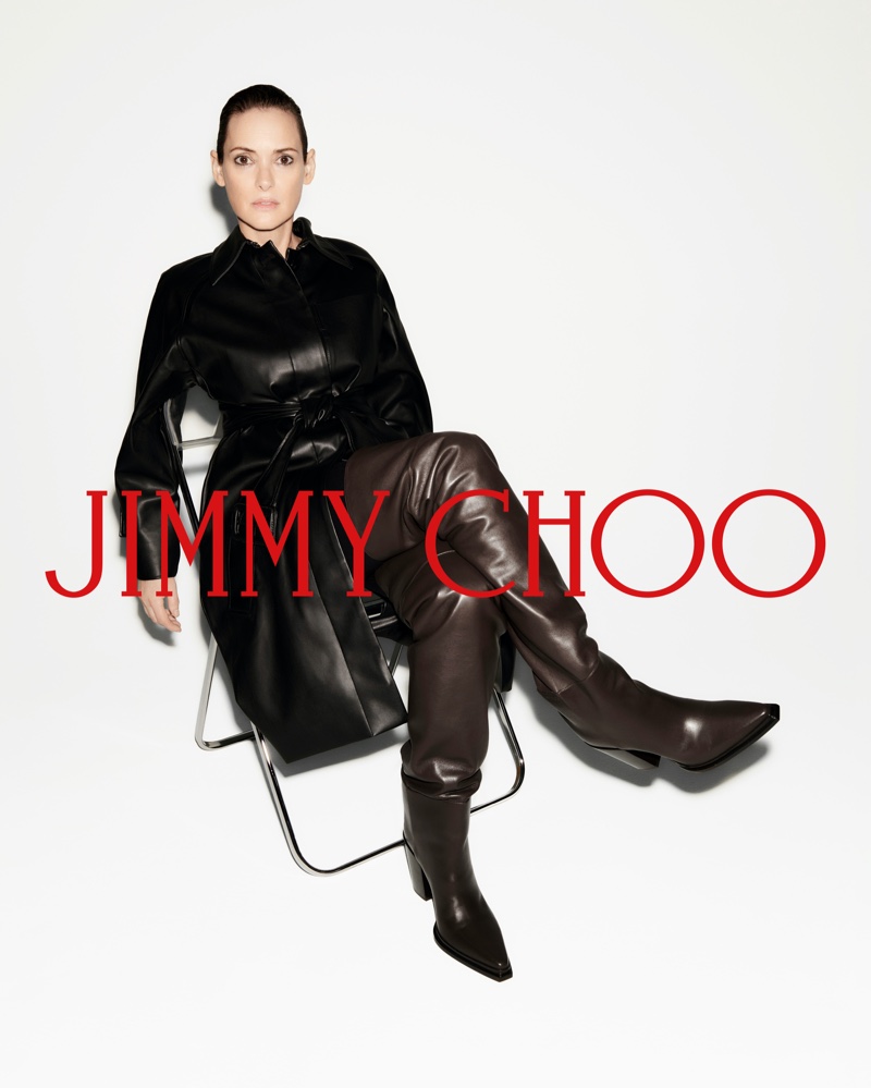 Clad in leather Winona Ryder wears thigh high boots in Jimmy Choo's fall 2024 campaign.